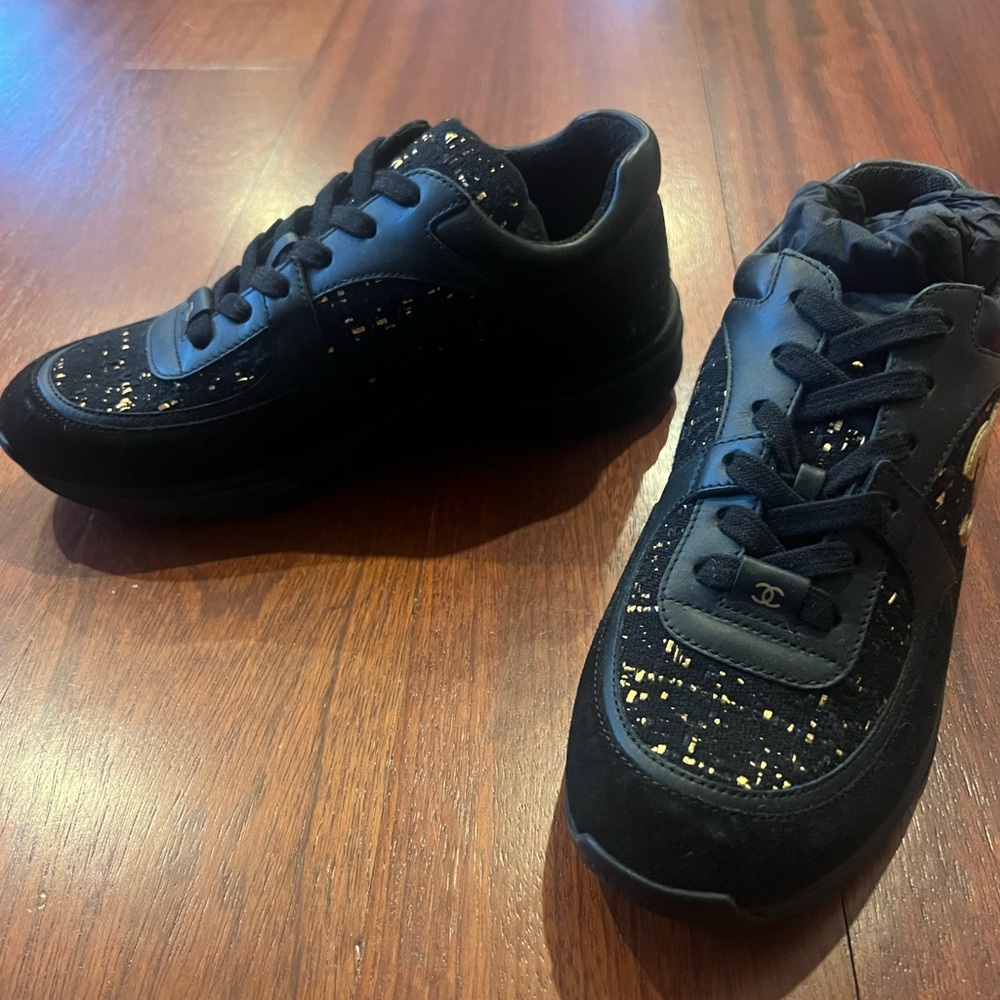 Chanel black and gold suede and nylon sneakers. Never worn. No box.